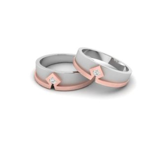Platinum and  18K Gold Couple Rings with Diamonds (0.23 Ct)
